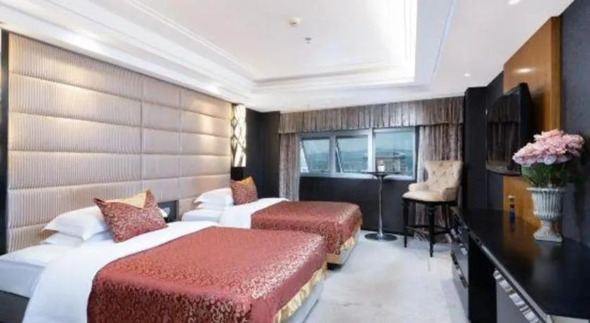 Bed in Nanning Sanzan Hotel