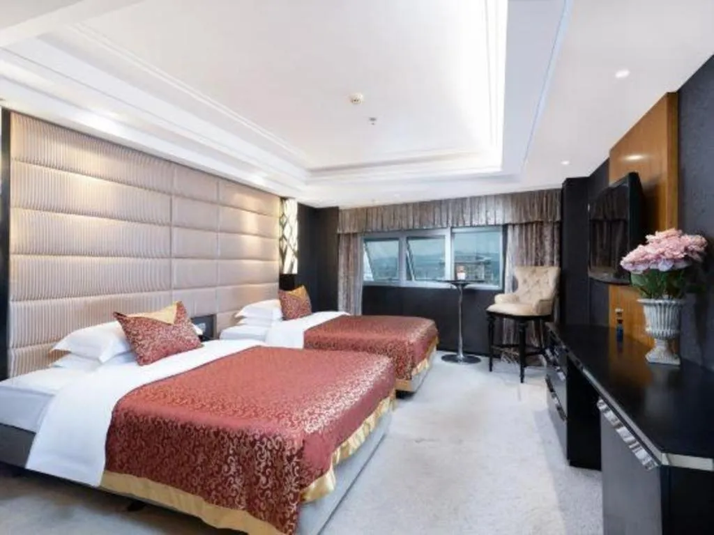 Bed in Nanning Sanzan Hotel