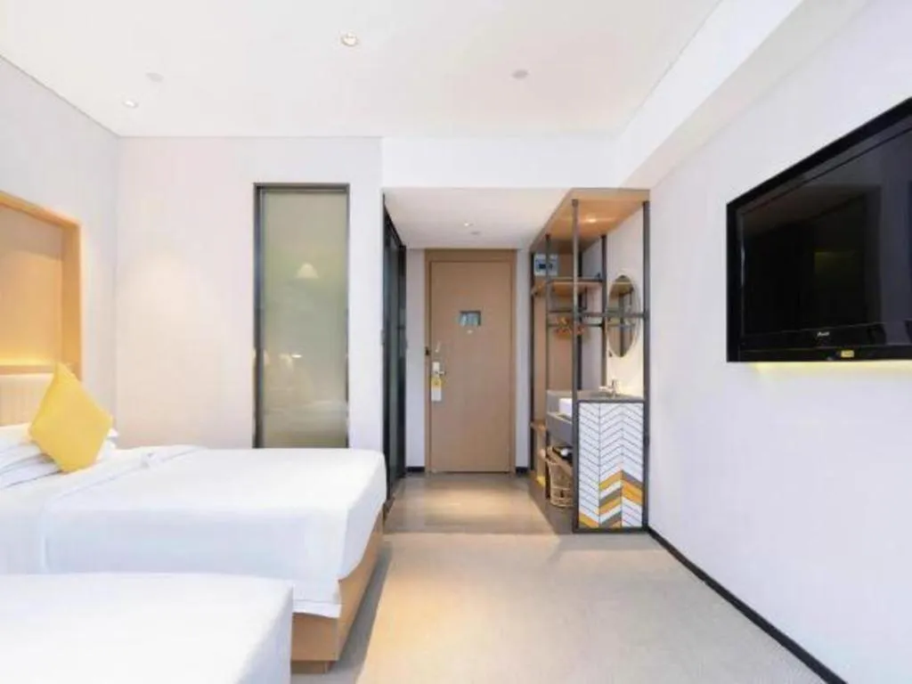 Bed in Nanning Sanzan Hotel