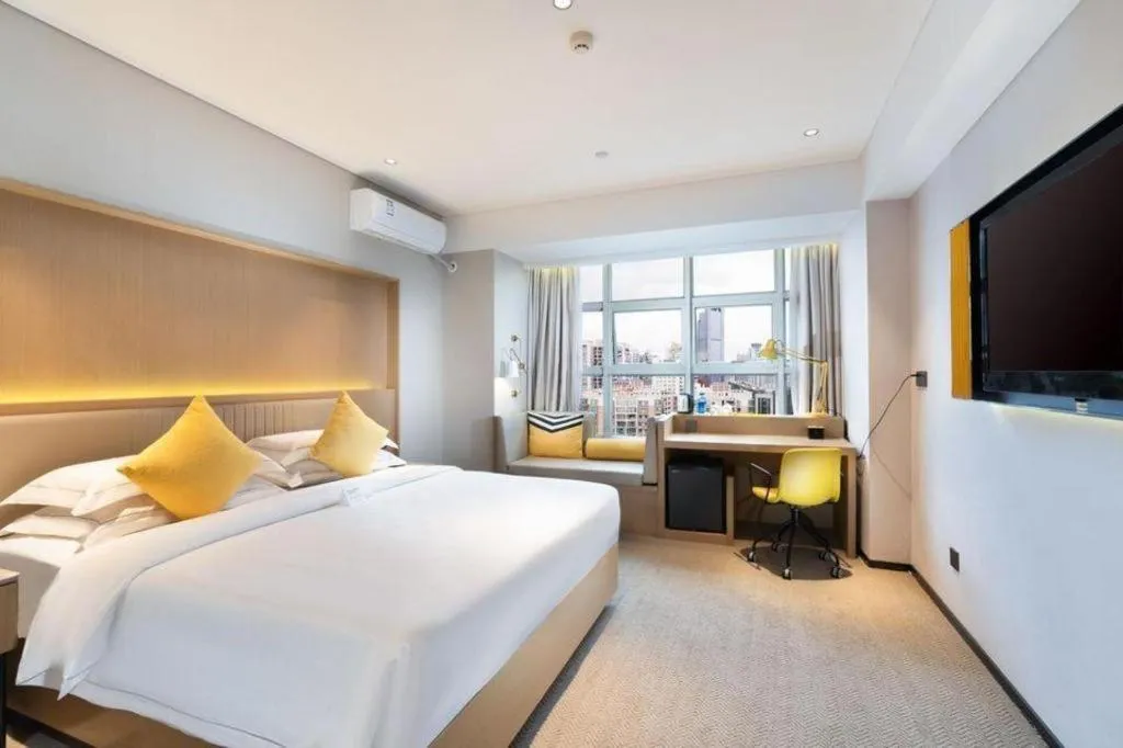 Bed in Nanning Sanzan Hotel