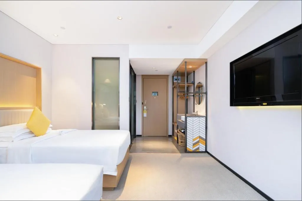 Bed in Nanning Sanzan Hotel