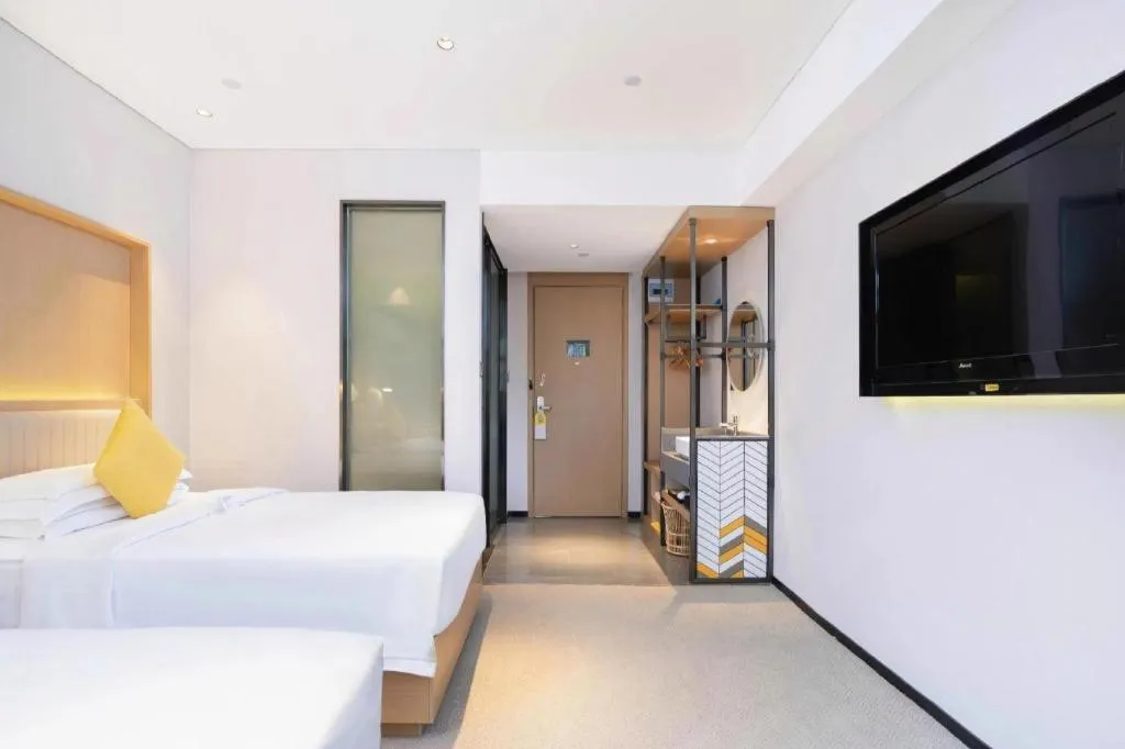 Bed in Nanning Sanzan Hotel