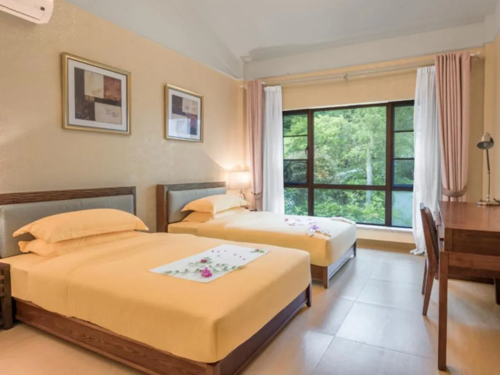 Bed in Country Garden Phoenix Hotel Zhangjiajie