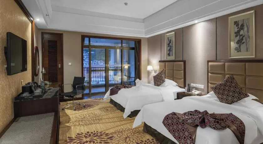 Bed in Country Garden Phoenix Hotel Zhangjiajie