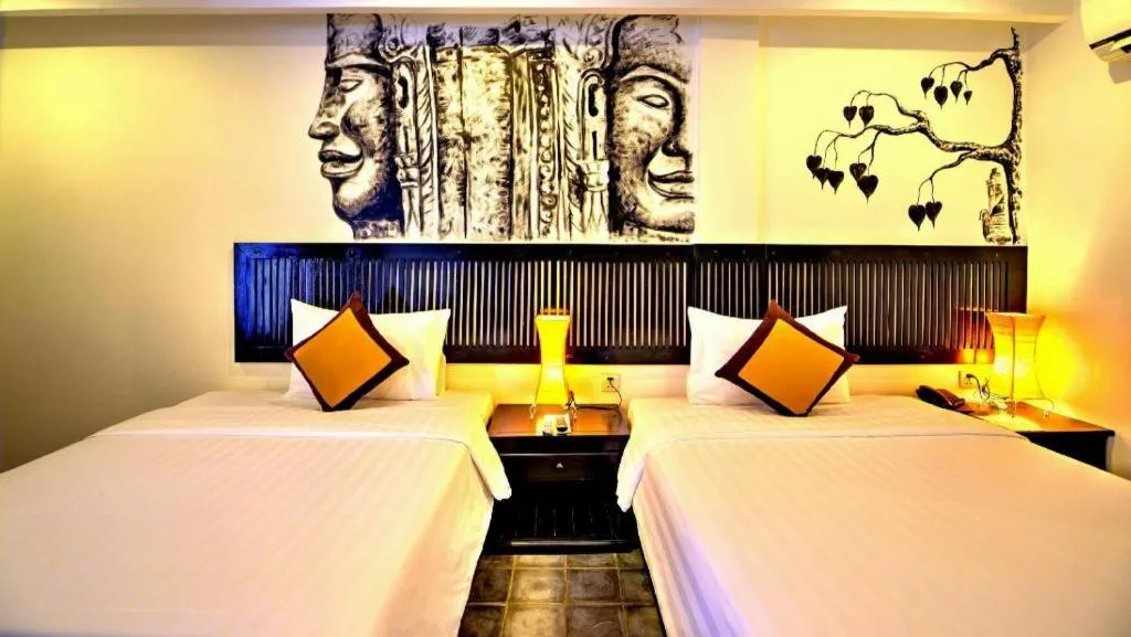 Bed in La Residence Blanc D' Angkor