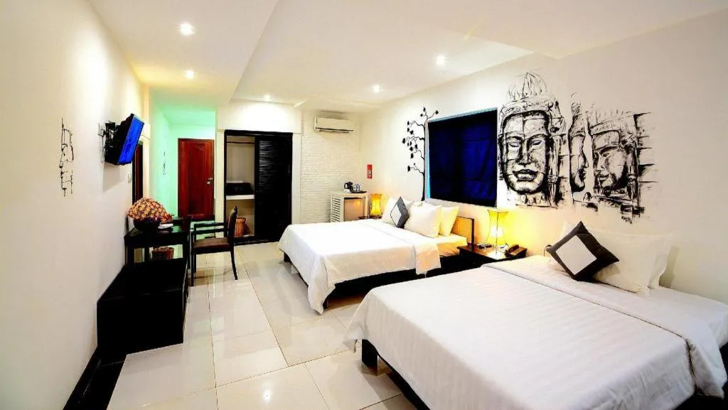 Bed in La Residence Blanc D' Angkor