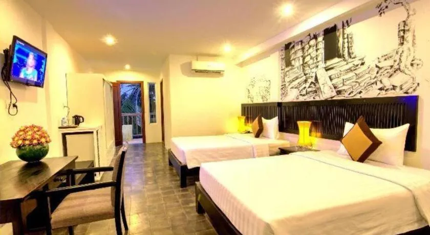 Bed in La Residence Blanc D' Angkor