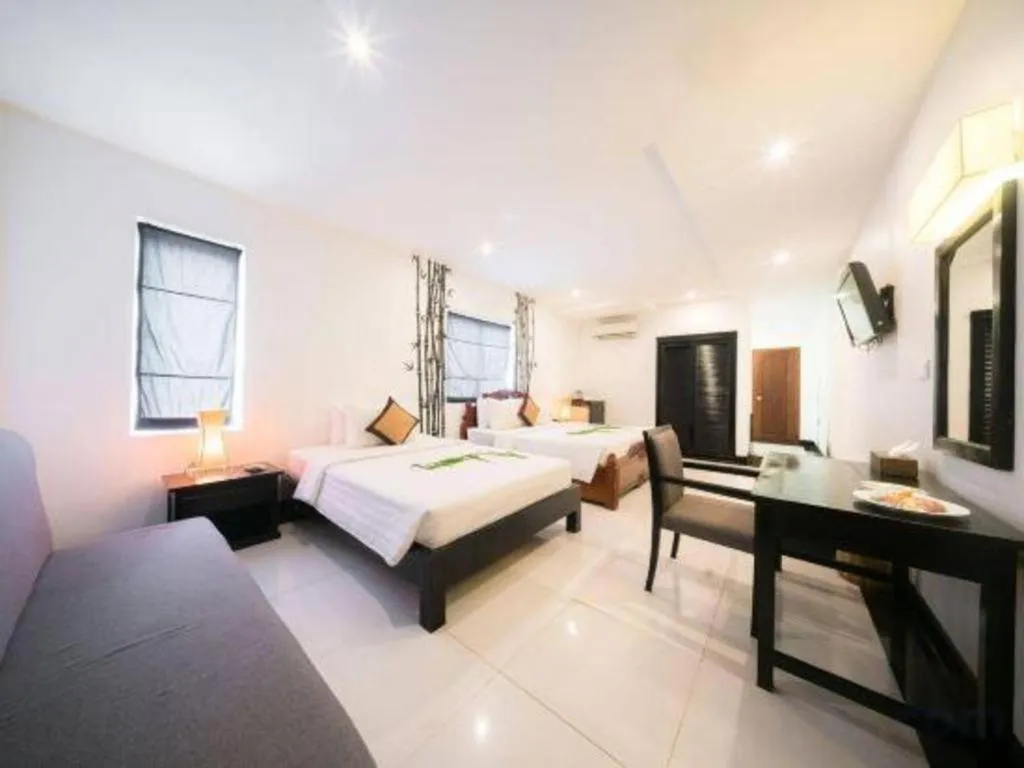 Bed in La Residence Blanc D' Angkor