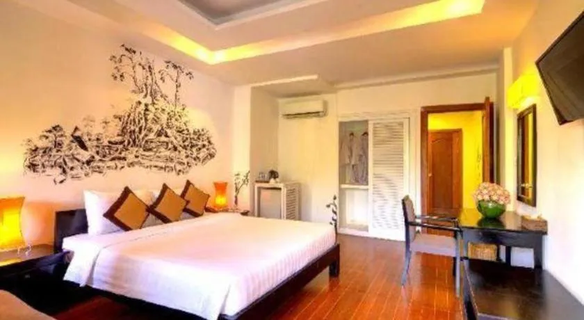 Bed in La Residence Blanc D' Angkor