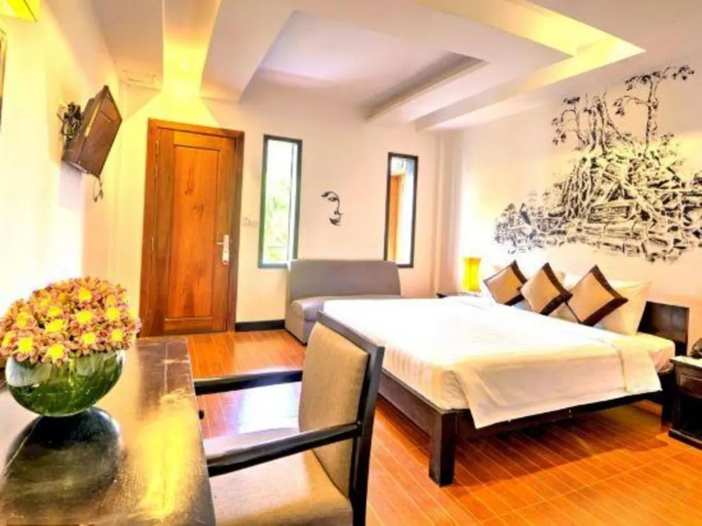 Bed in La Residence Blanc D' Angkor