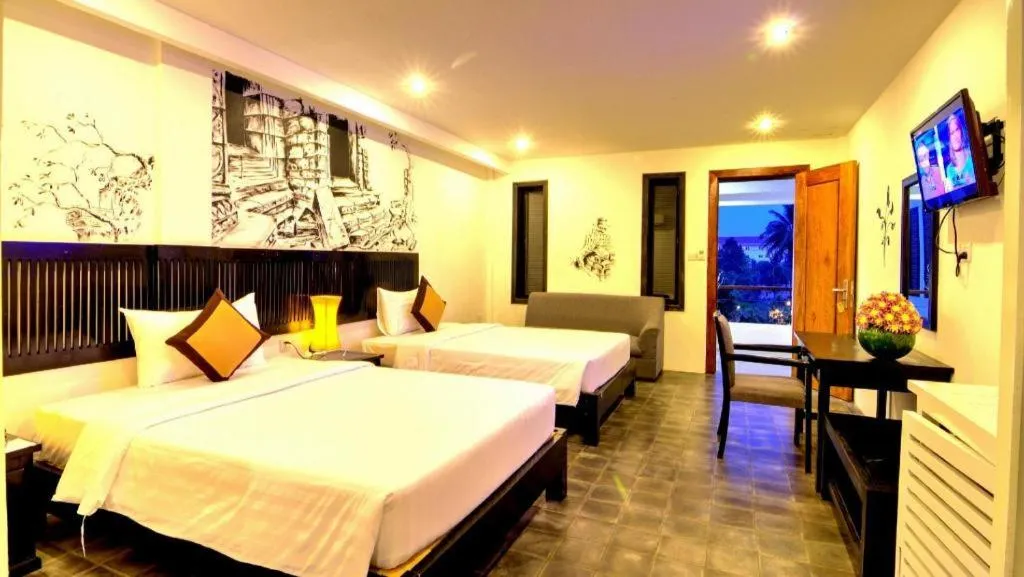 Bed in La Residence Blanc D' Angkor