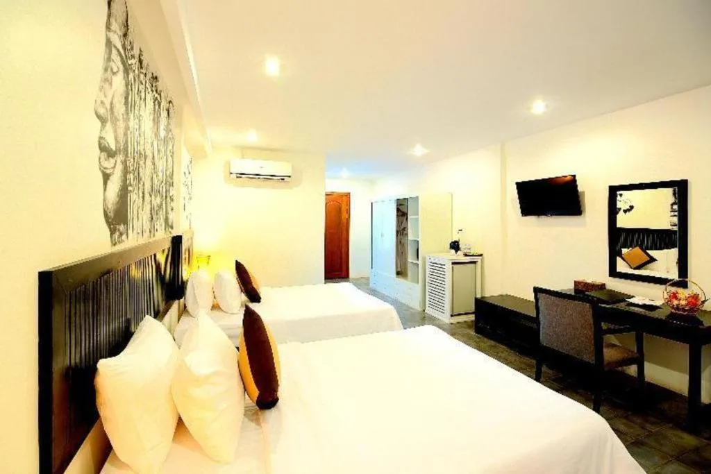 Bed in La Residence Blanc D' Angkor