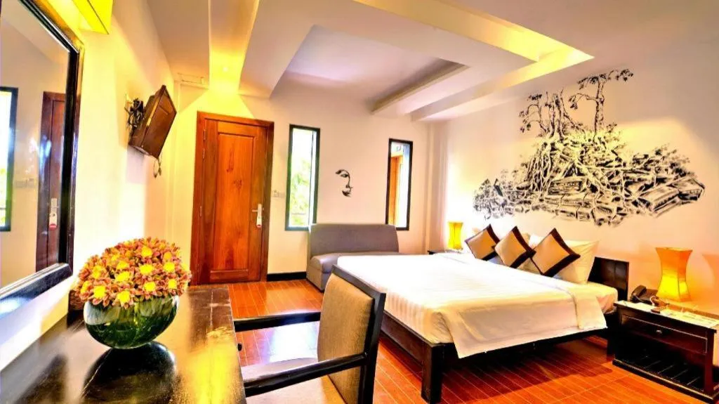 Bed in La Residence Blanc D' Angkor