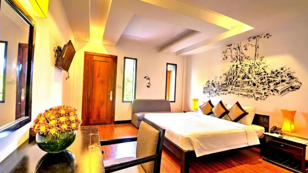 Bed in La Residence Blanc D' Angkor