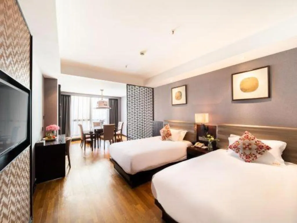 Bed in Yiwu Orange Boutique Hotel