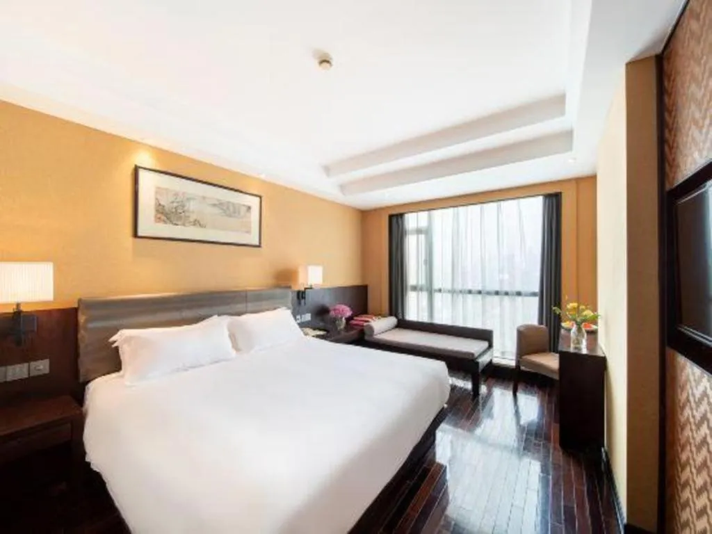 Bed in Yiwu Orange Boutique Hotel