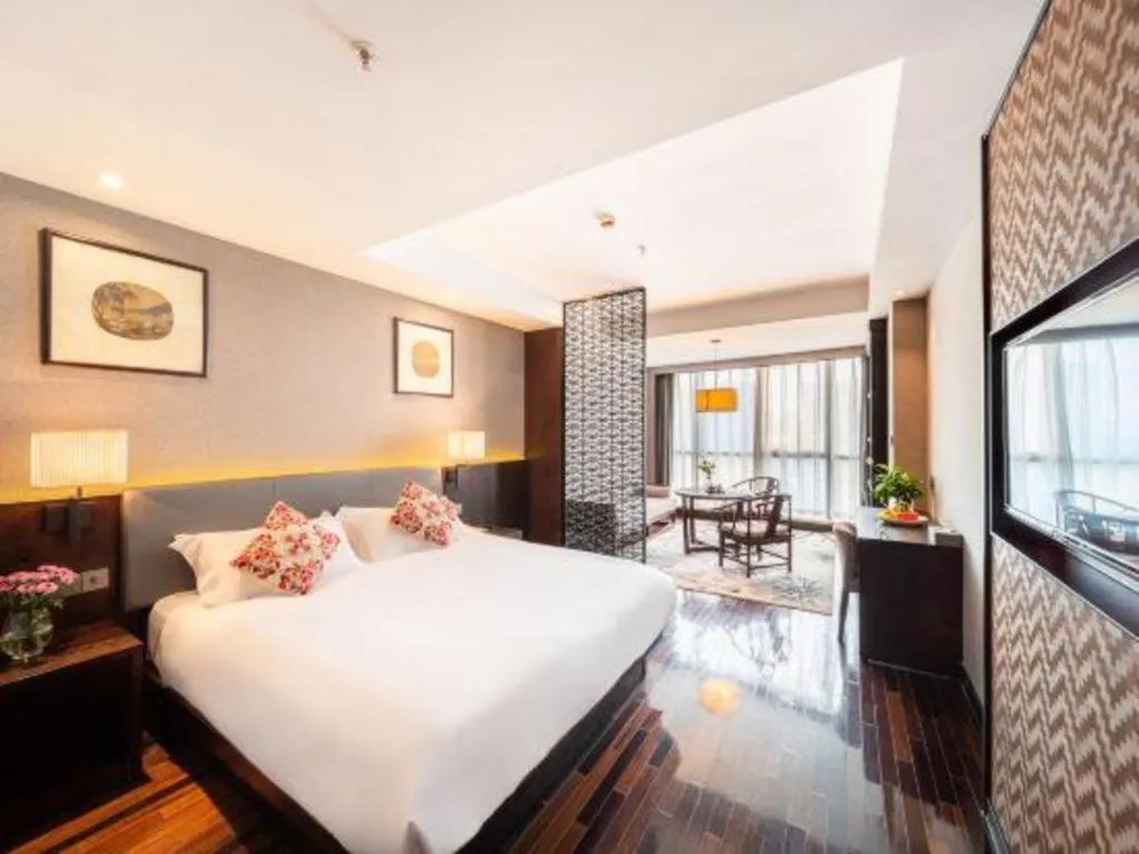 Bed in Yiwu Orange Boutique Hotel