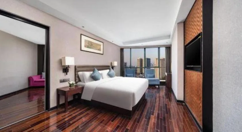 Bed in Yiwu Orange Boutique Hotel
