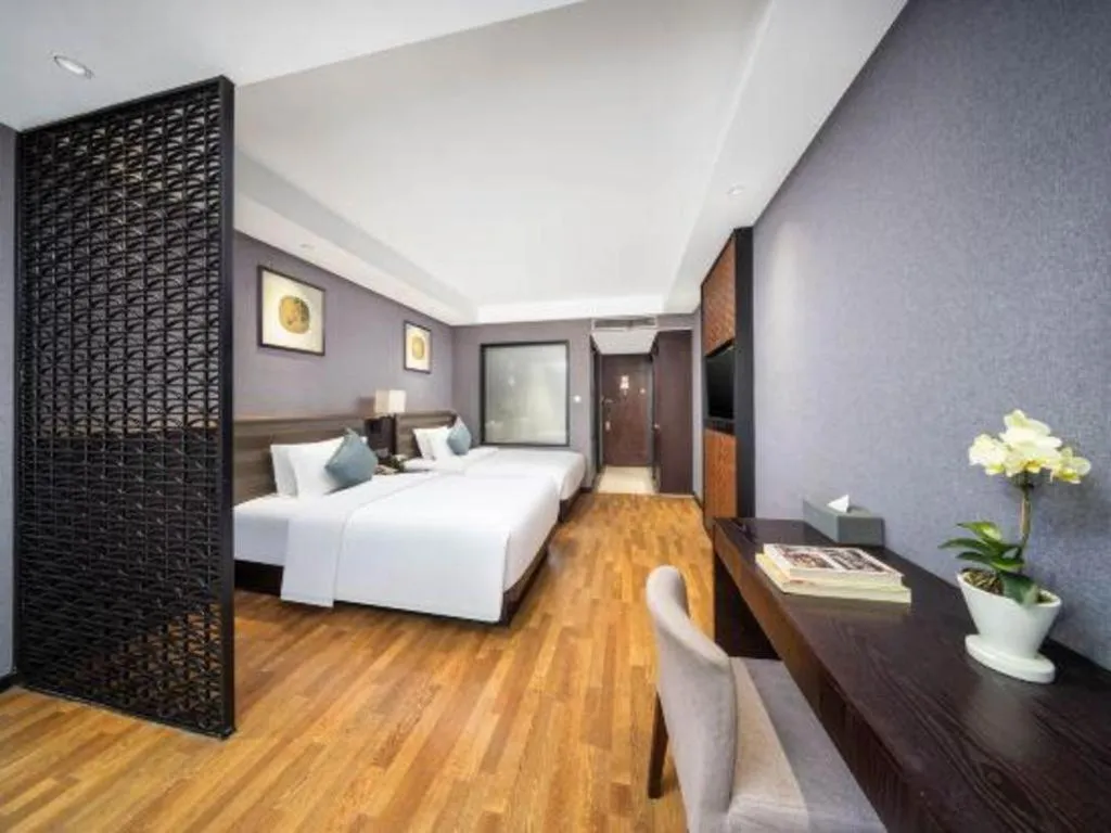 Bed in Yiwu Orange Boutique Hotel