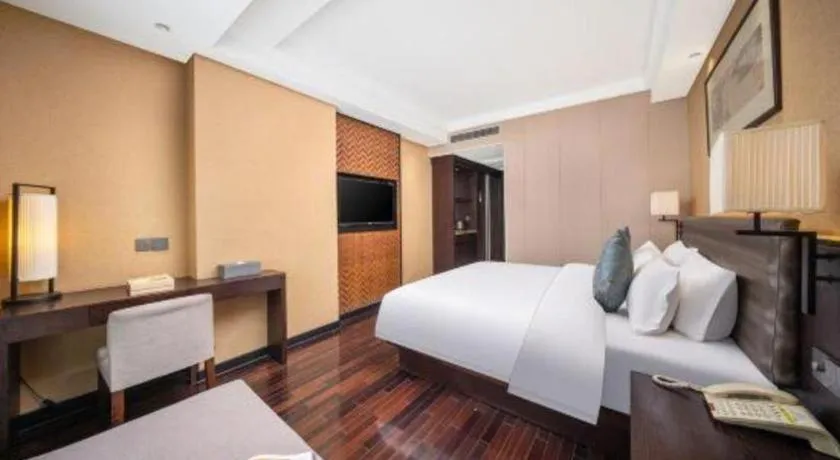 Bed in Yiwu Orange Boutique Hotel