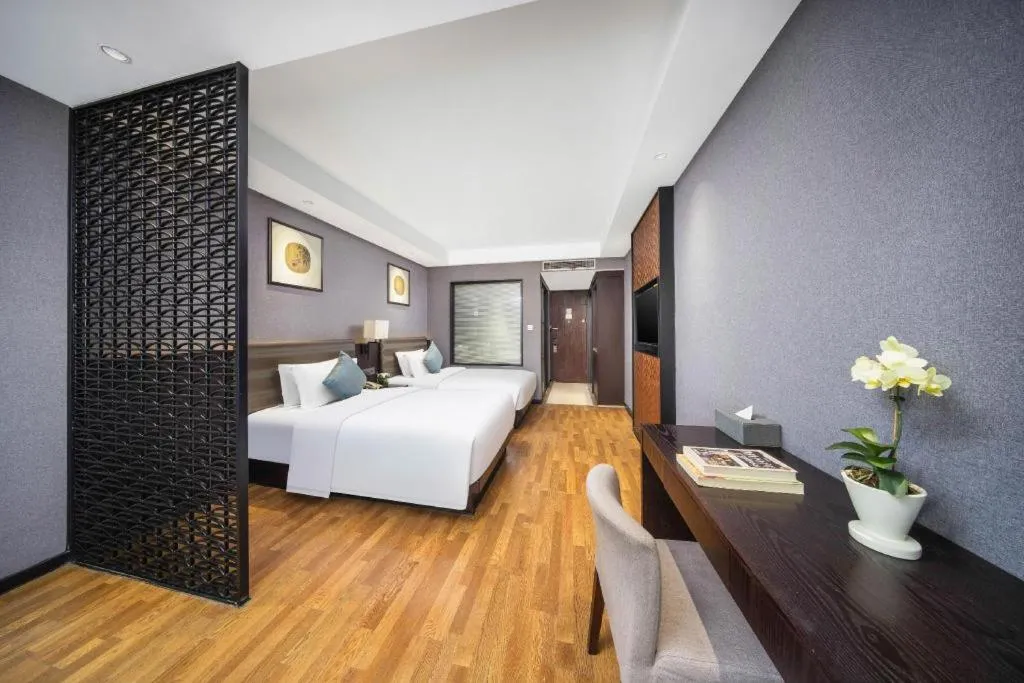 Bed in Yiwu Orange Boutique Hotel
