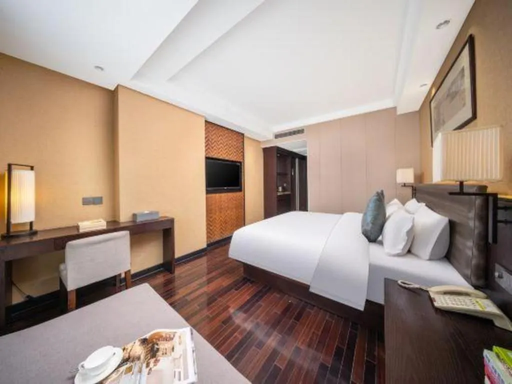 Bed in Yiwu Orange Boutique Hotel