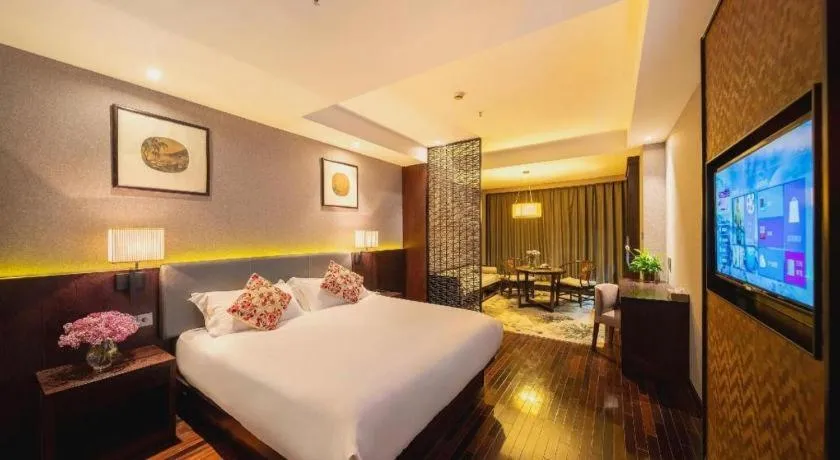 Bed in Yiwu Orange Boutique Hotel