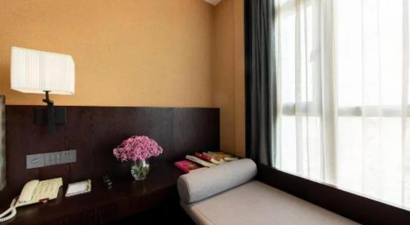 Bed in Yiwu Orange Boutique Hotel