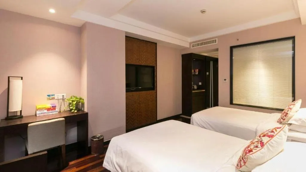 Bed in Yiwu Orange Boutique Hotel
