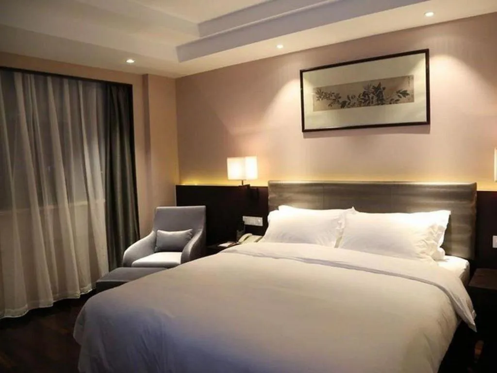 Bed in Yiwu Orange Boutique Hotel