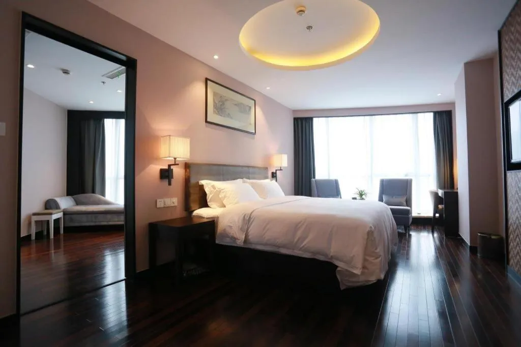 Bed in Yiwu Orange Boutique Hotel