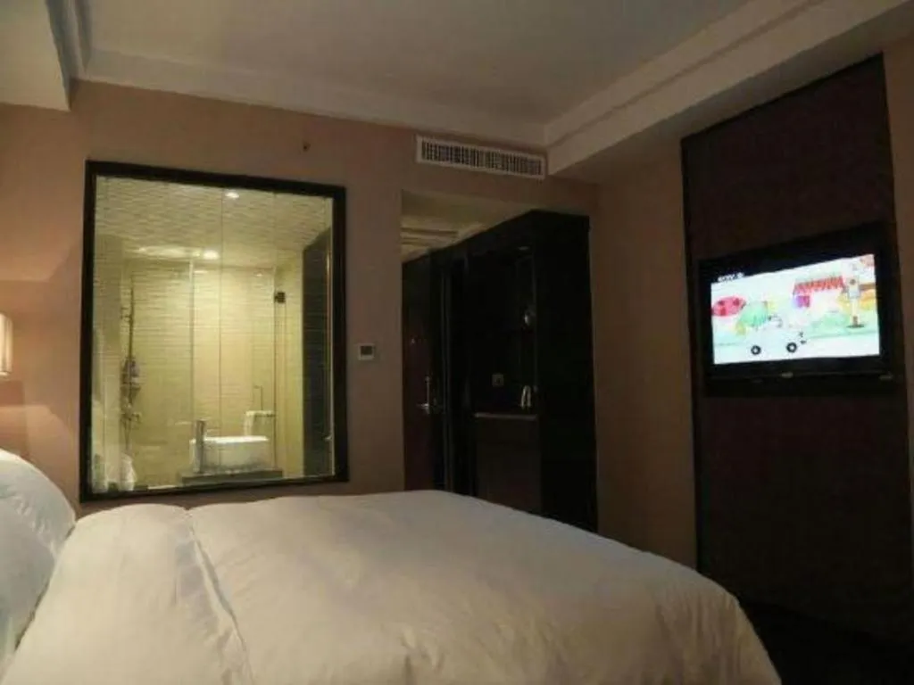 Bed in Yiwu Orange Boutique Hotel
