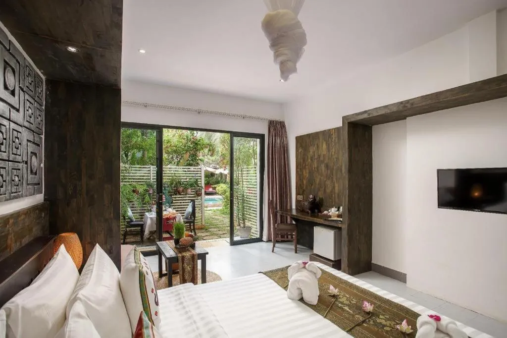 Bed in Ladear Angkor Boutique Hotel