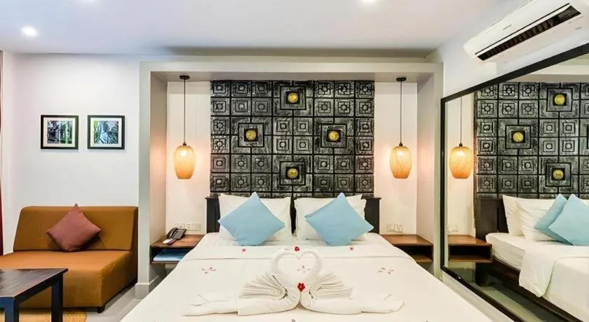 Bed in Ladear Angkor Boutique Hotel