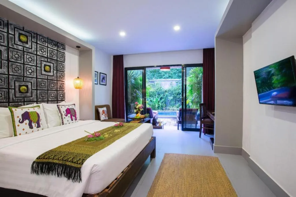 Bed in Ladear Angkor Boutique Hotel
