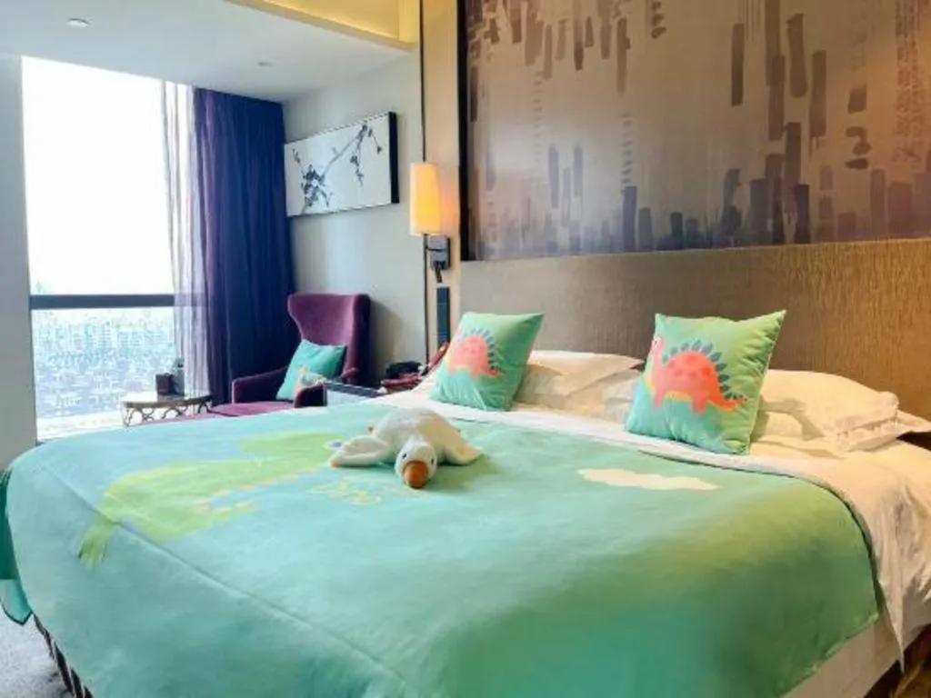 Bed in Shijiazhuang Ximeijin Continental Hotel