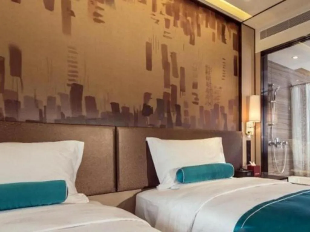 Bed in Shijiazhuang Ximeijin Continental Hotel