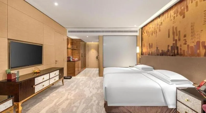 Bed in Shijiazhuang Ximeijin Continental Hotel