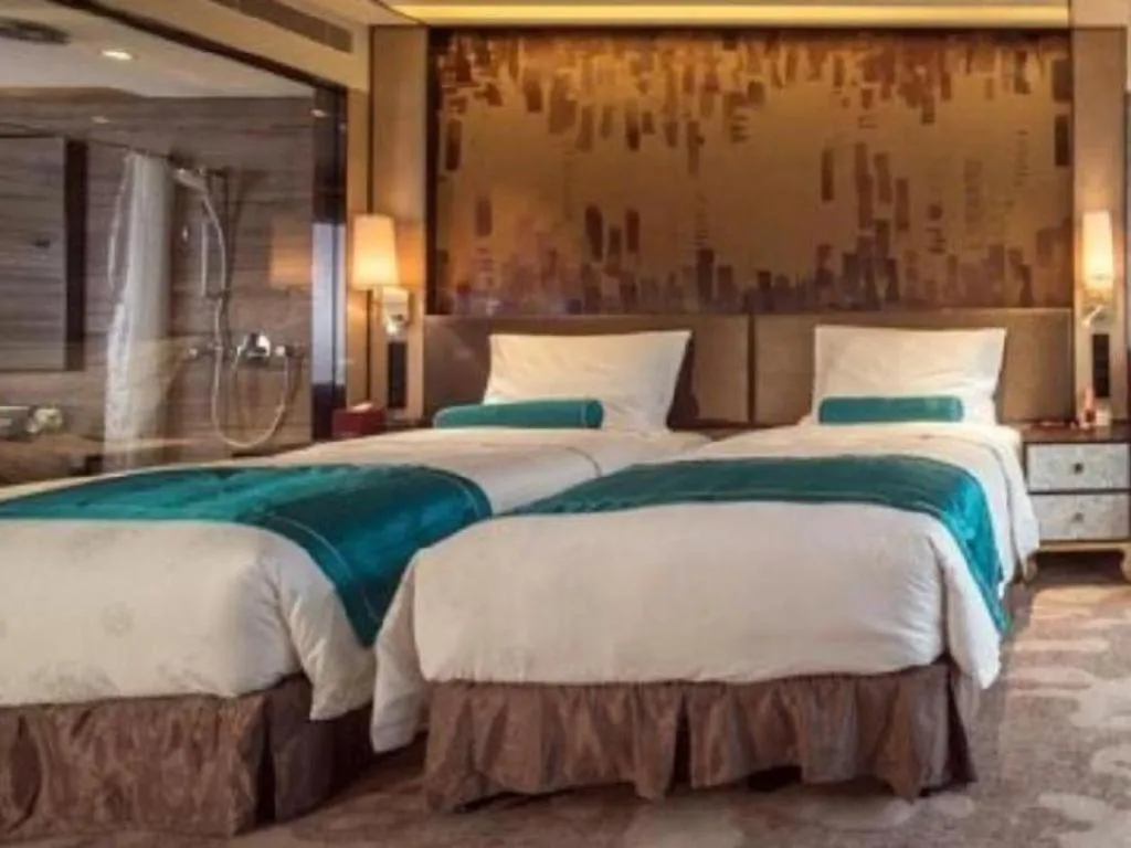 Bed in Shijiazhuang Ximeijin Continental Hotel