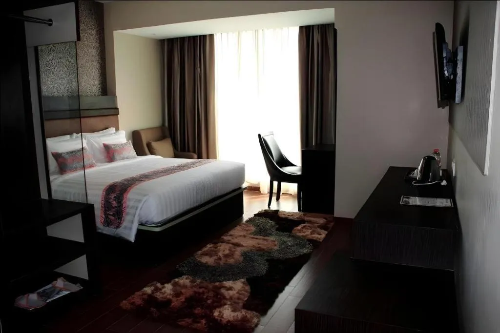 Bed in The Belagri Hotel and Convention