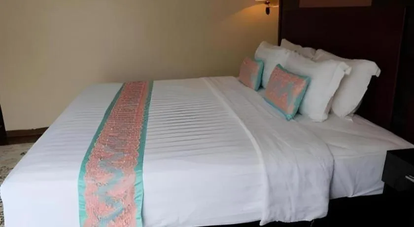 Bed in The Belagri Hotel and Convention