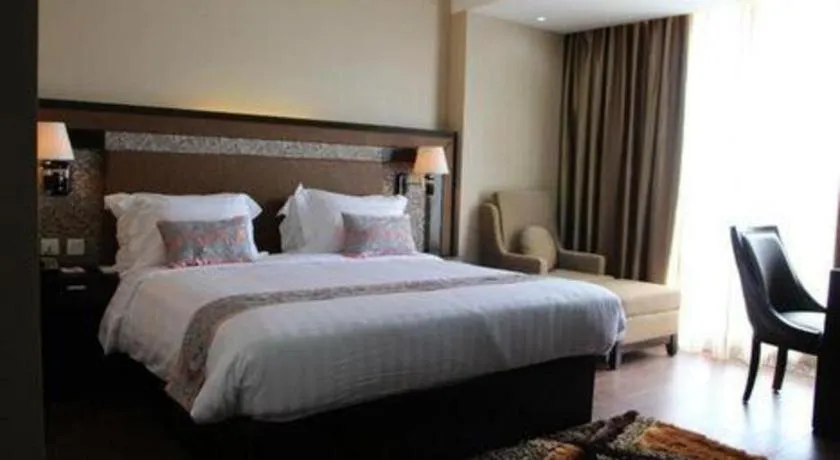 Bed in The Belagri Hotel and Convention