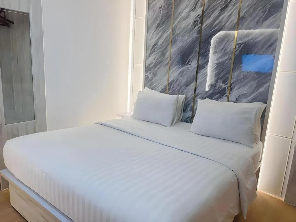 Bed in The Belagri Hotel and Convention