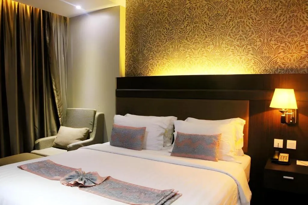 Bed in The Belagri Hotel and Convention