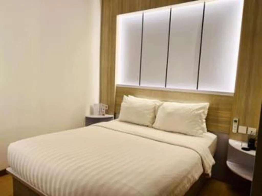 Bed in The Belagri Hotel and Convention