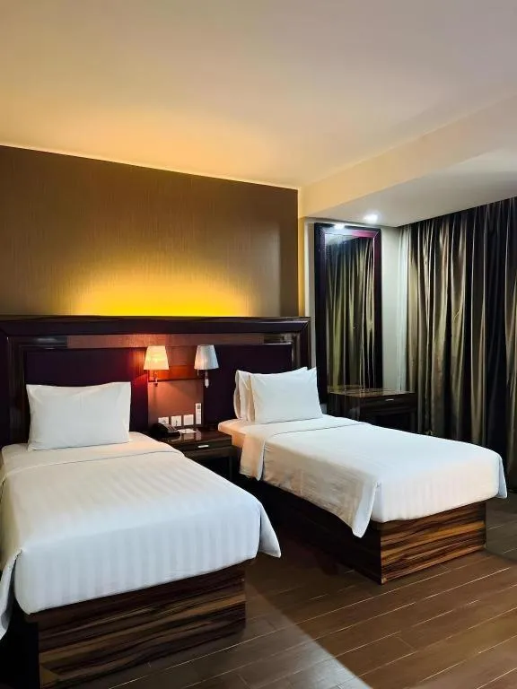 Bed in The Belagri Hotel and Convention