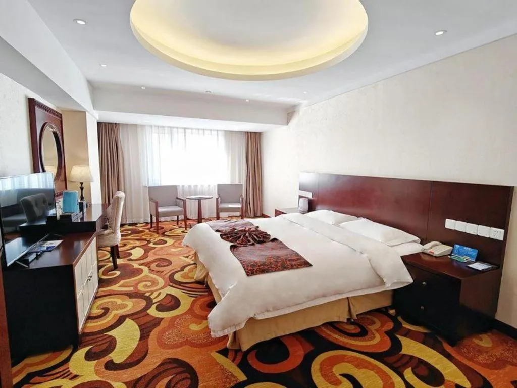 Bed in Dalian Southern Airline Pearl Hotel
