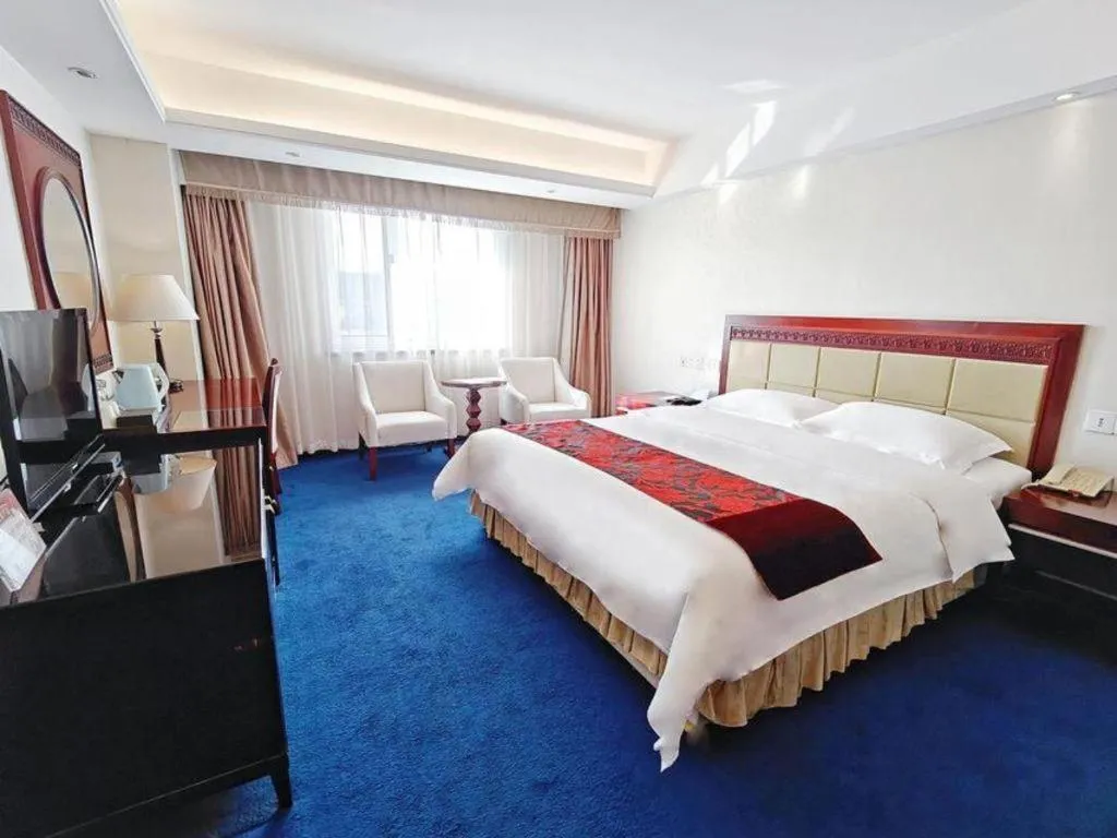 Bed in Dalian Southern Airline Pearl Hotel