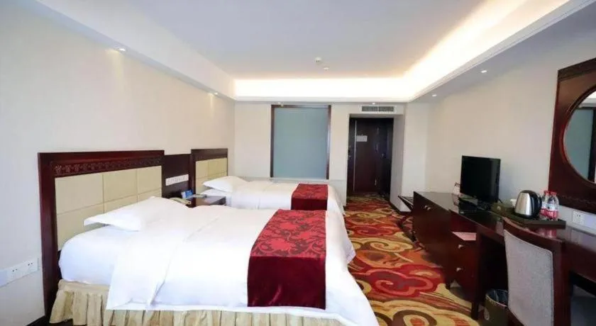 Bed in Dalian Southern Airline Pearl Hotel