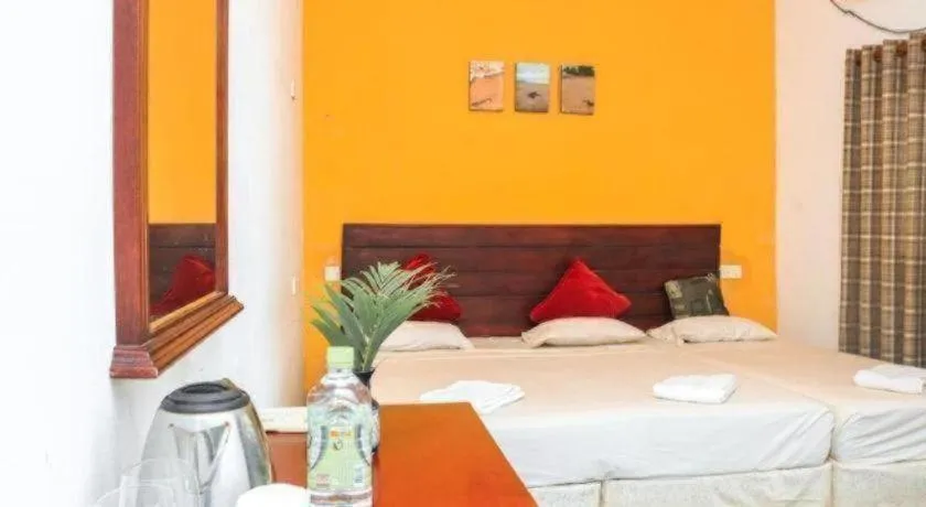 Bed in New Tristar Beach Hotel